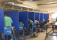 In the welding shop at our training center, we teach Mig, Tig, and stick welding plus grinding and finishing.